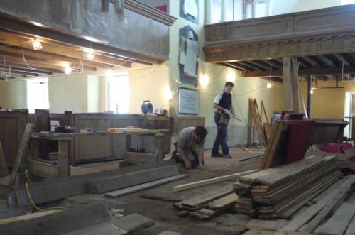 Graham and Christoph relaying the floorboards in the East Church, Cromarty